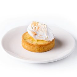 Lemon tartlet with meringue on plate
