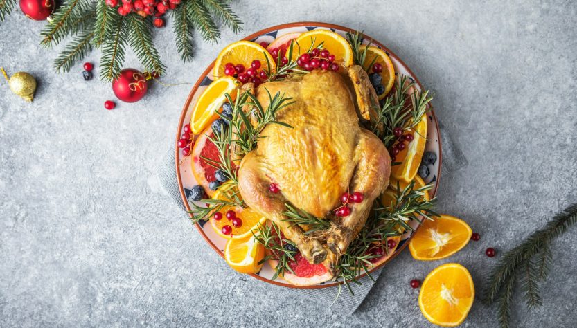 Roasted chicken or turkey. Traditional festive food for Christmas or Thanksgiving. Christmas Dinner
